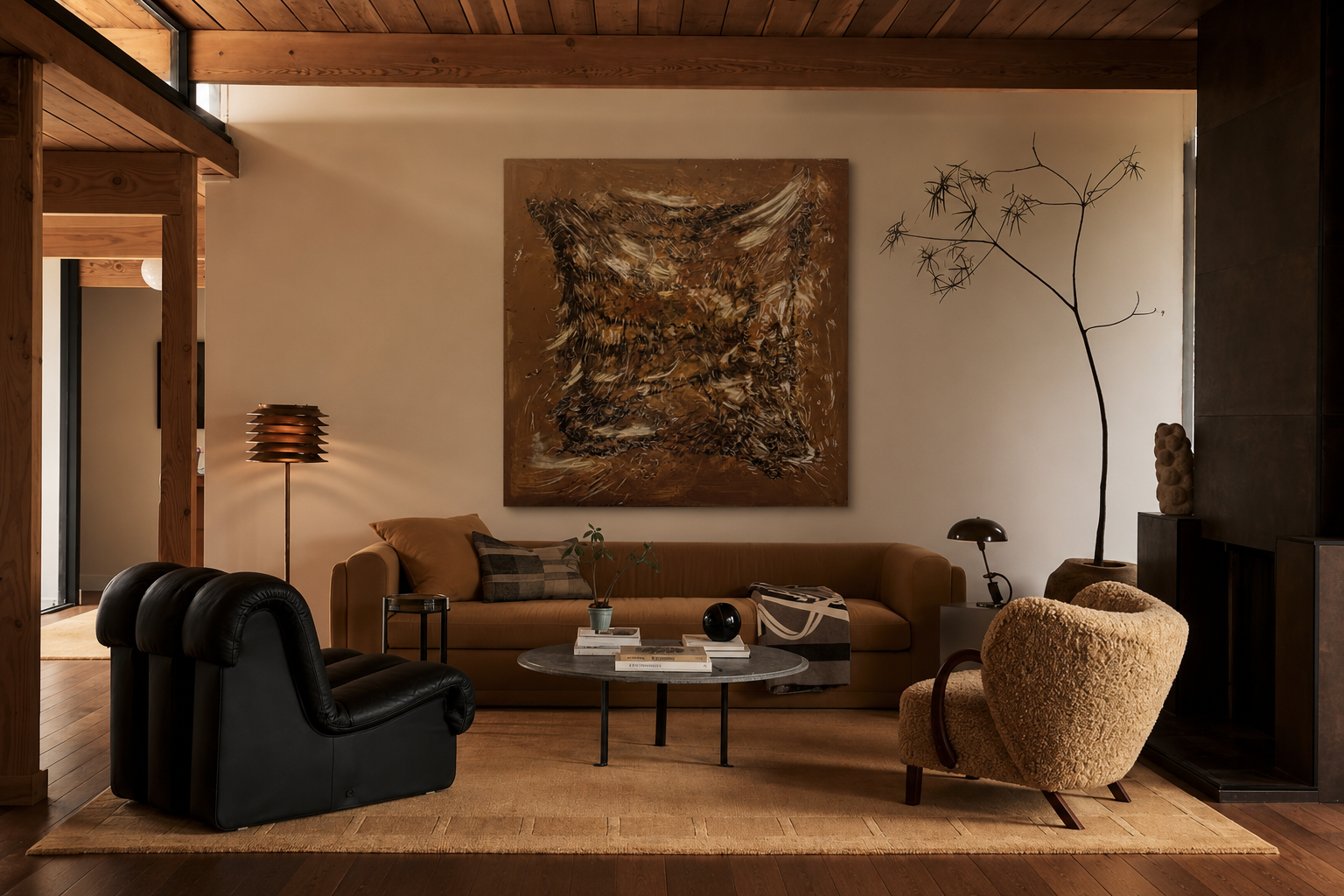 Modern living room with brown sofa, black armchair, and abstract painting on wall.