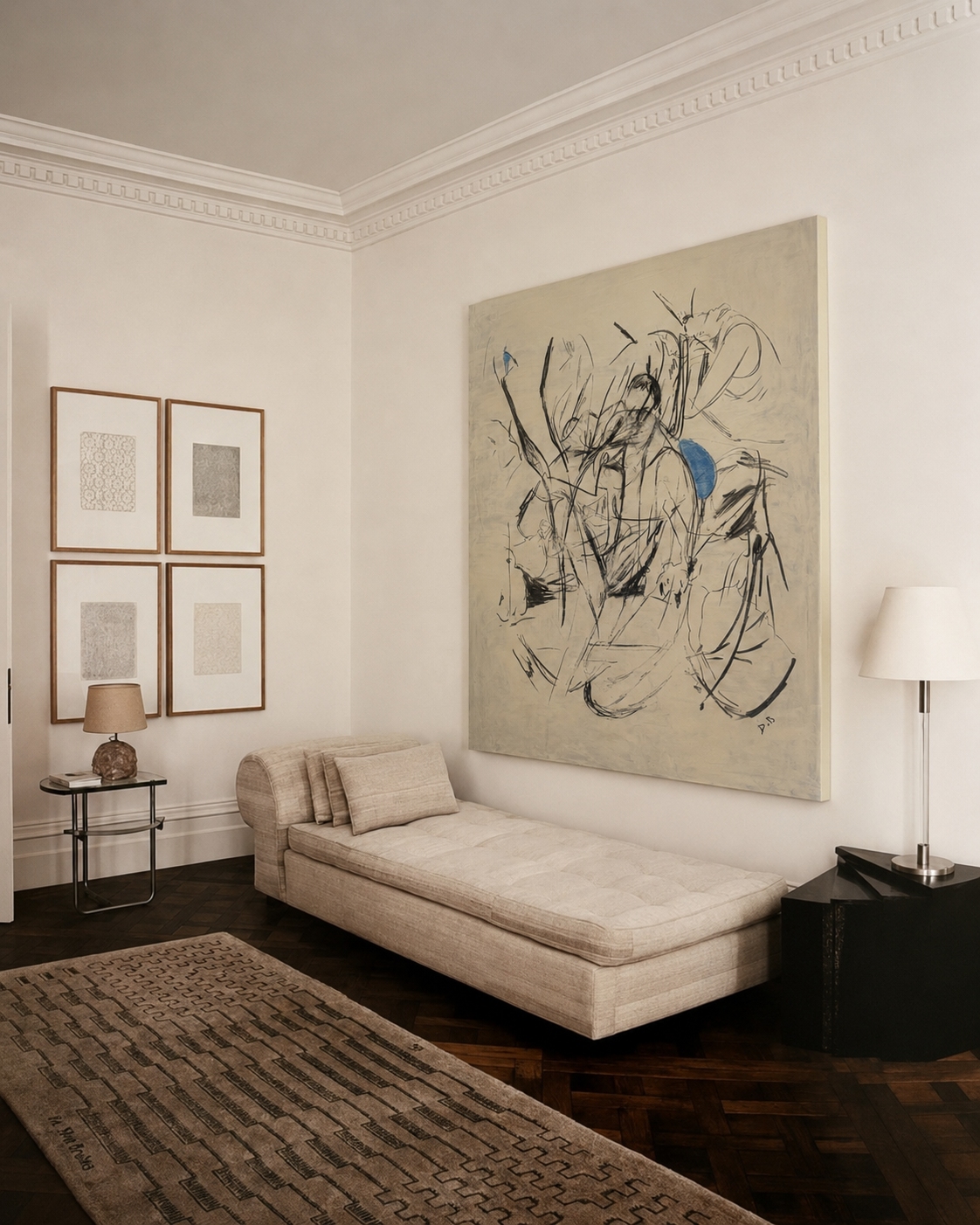 Living room with a large abstract painting on the wall, a chaise lounge, and framed artwork.